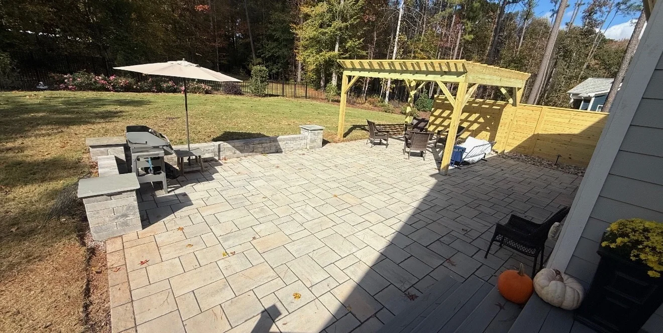 Paver patio beside a home in YardU’s shared project album